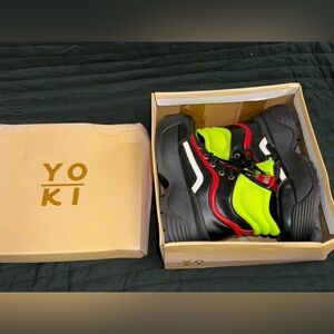 Yoki Boot Sneakers in black, red, and neon yellow.